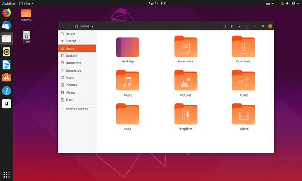Gestionnaire de fichiers Ubuntu 19.04 avec icônes du bureau en arrière-plan